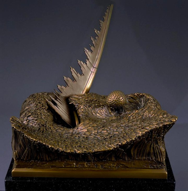 &ldquo;Rough It&rdquo; bronze golf sculpture on a black granite pedestal