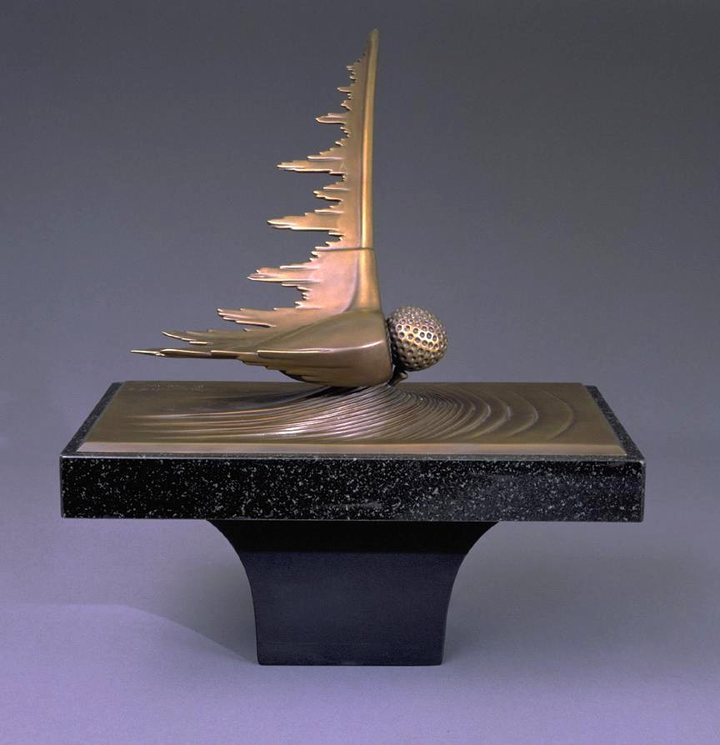 &ldquo;Solid Impact&rdquo; bronze golf sculpture on a black granite pedestal